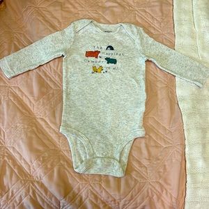 Grey long-sleeve onesie.